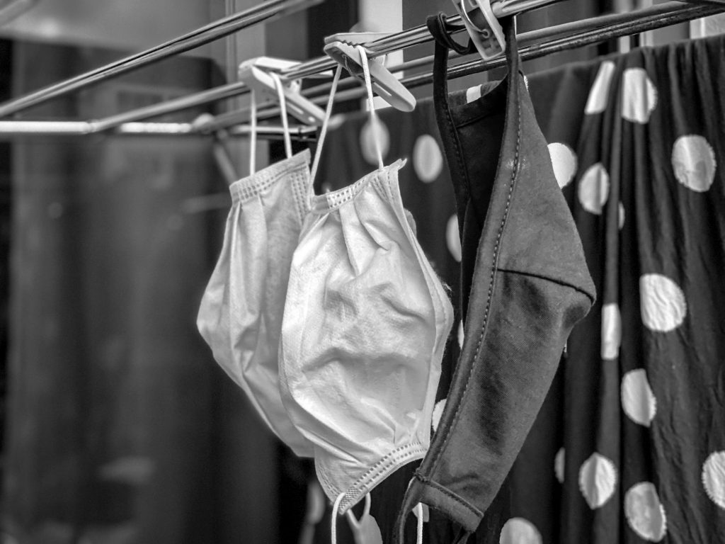 Masks hung outside for drying