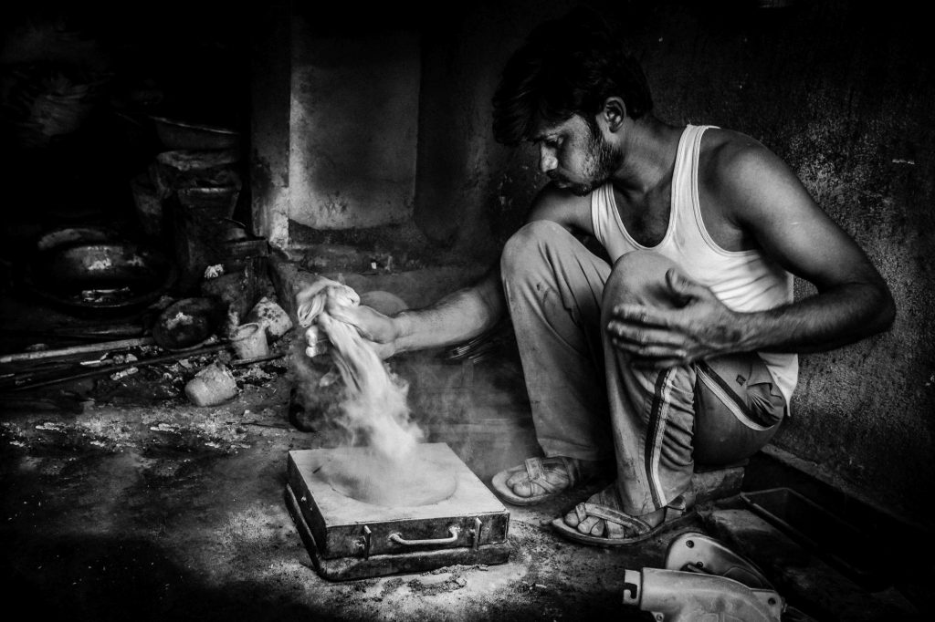 A worker prepares the mold