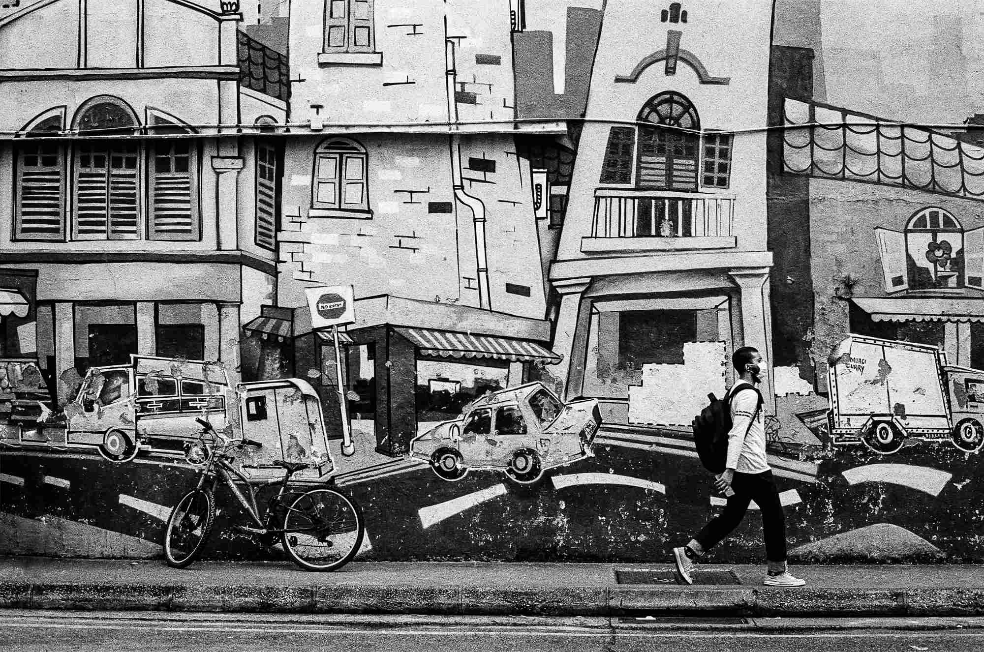 Monochrome never goes out of style... Beautiful wall-paintings in the streets of Little India, an ethnic district in Singapore. Ilford PAN 400 on Canon AE-1 Program.